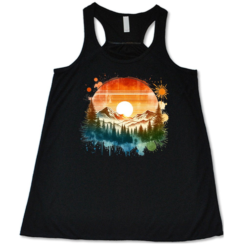 Black colored flowy tank with a sunset-mountain landscape graphic on it