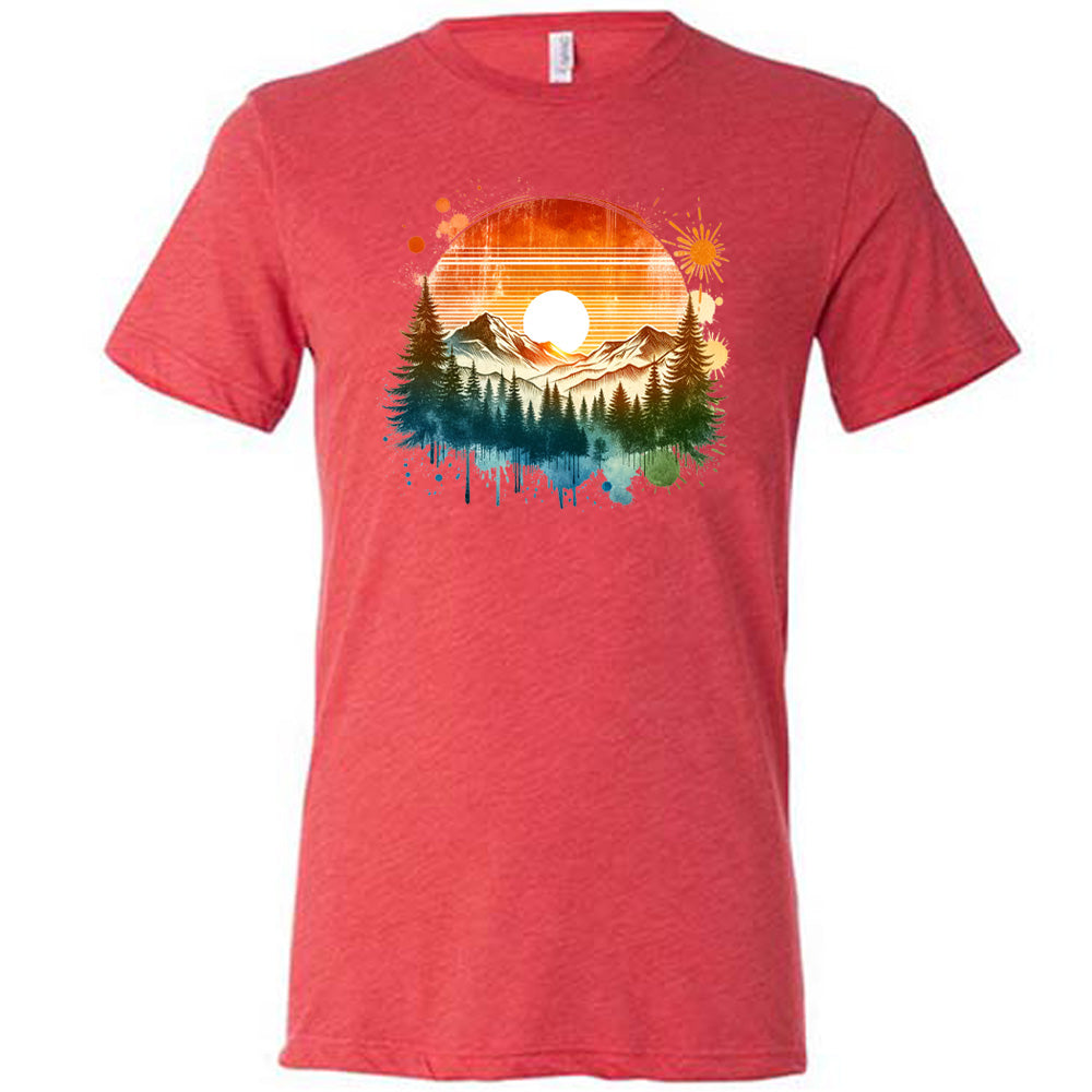 Red colored shirt with a sunset-mountain landscape graphic on it