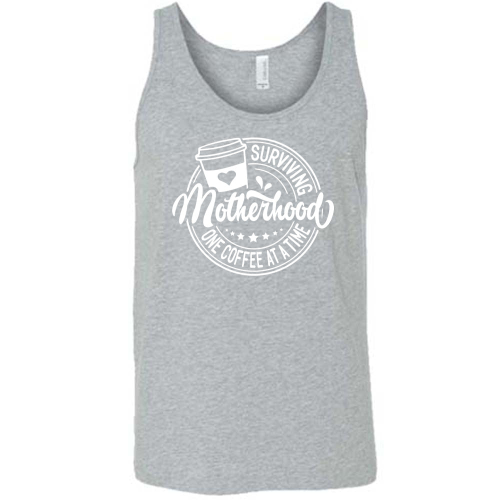 Grey colored tank with a coffee cup graphic on it that says "Surviving Motherhood One Coffee at a Time" 