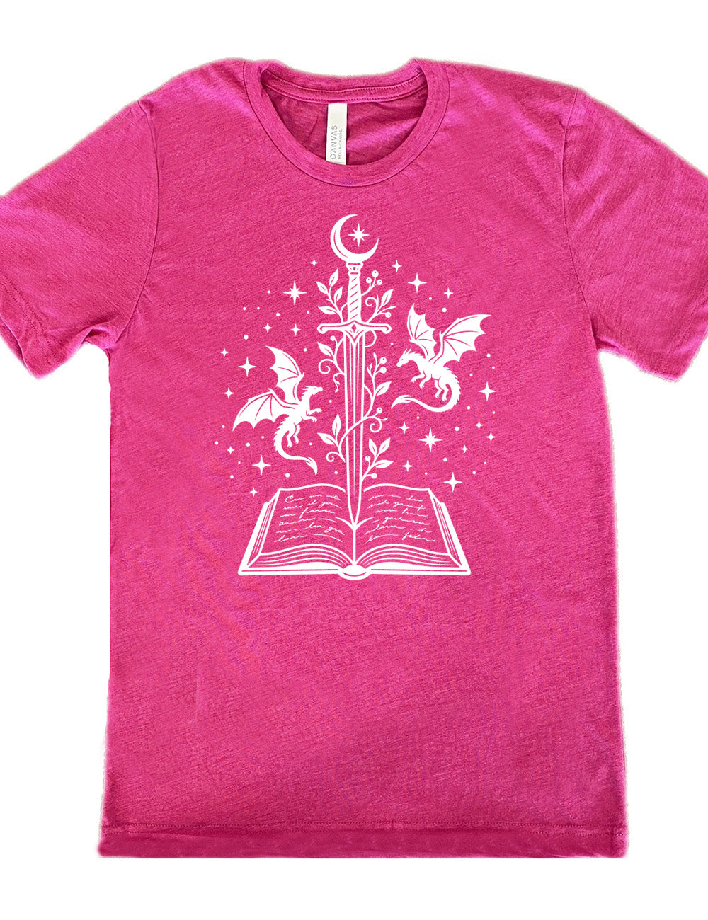 berry unisex tee with the graphic of a sword, with a crescent moon on top of the handle and with a vine wrapping around it, pointing down into an open book, surrounded by stars, and a dragon flying on either side