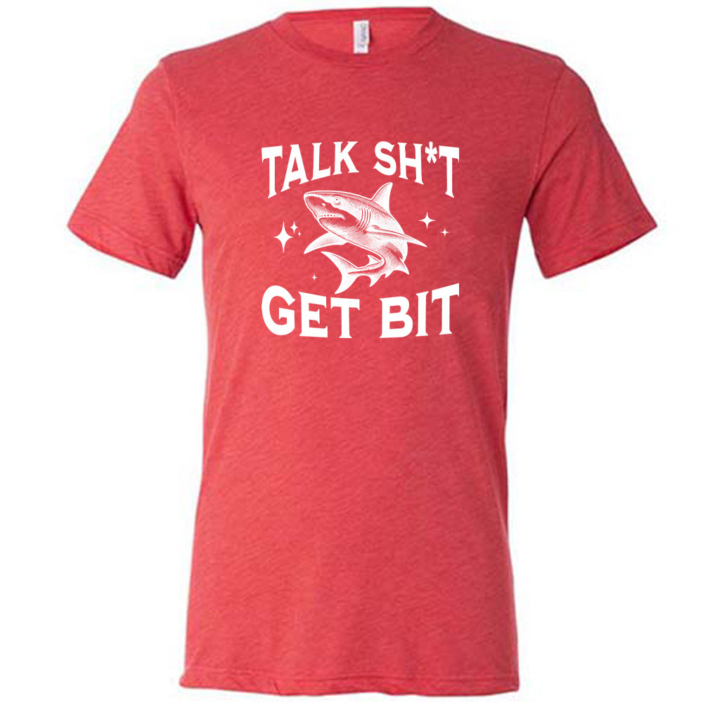 Red colored shirt with a shark graphic on it that says "Talk Shit Get Bit" 