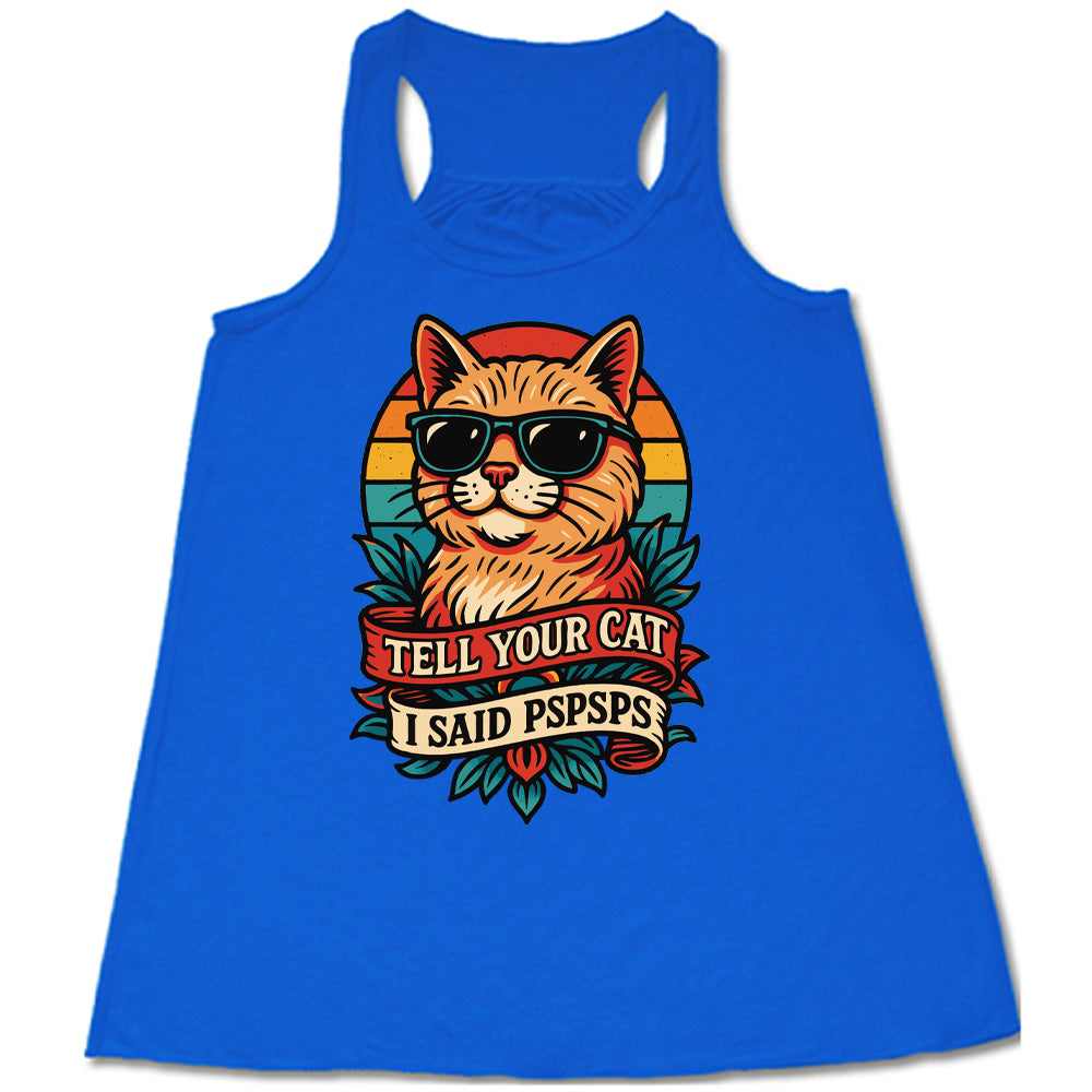 blue racerback tank with the large graphic of a cat head and torso, wearing sunglasses, with a colorful background, and two banners below it with the words "tell your cat I said pspsps" on them