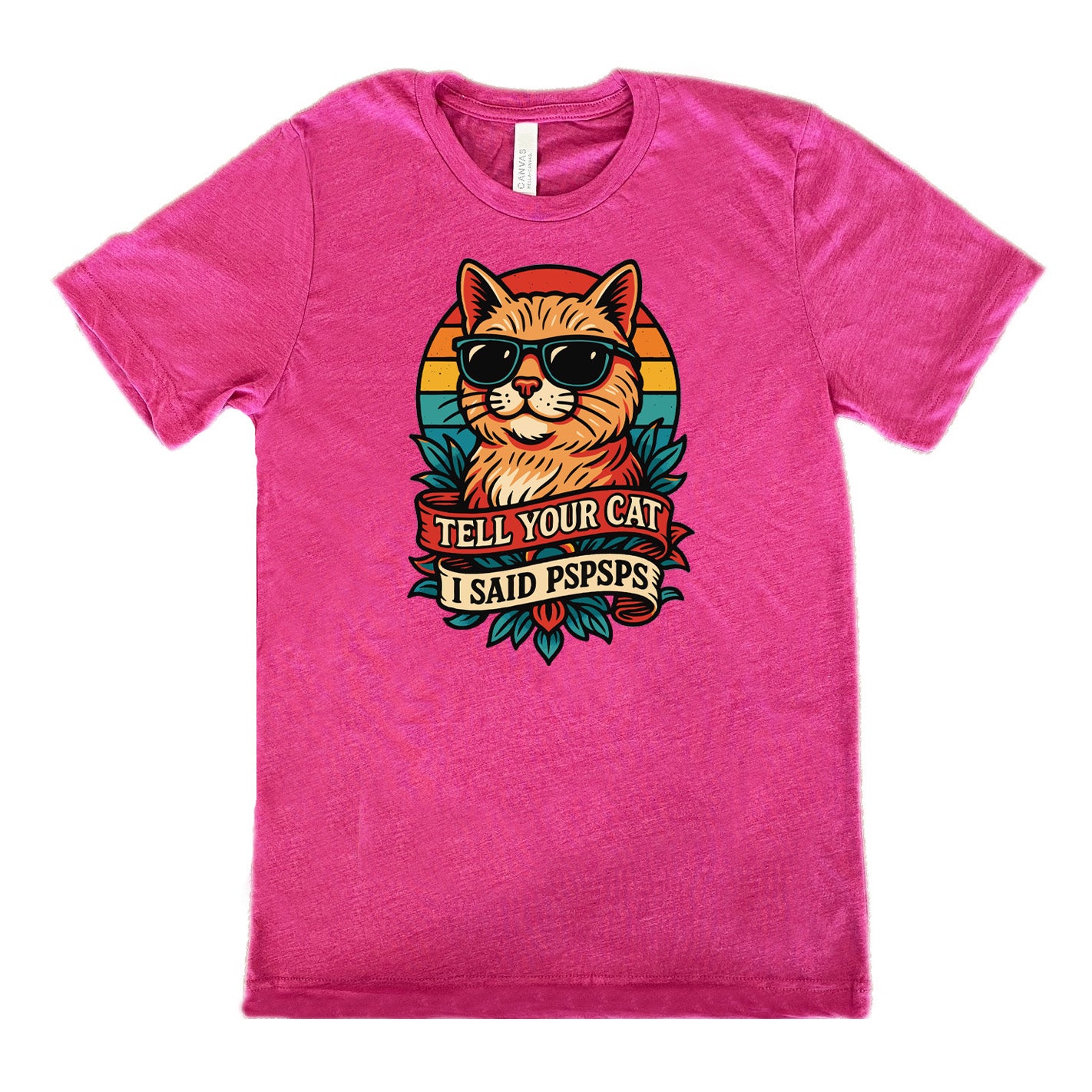 berry unisex tee with the large graphic of a cat head and torso, wearing sunglasses, with a colorful background, and two banners below it with the words "tell your cat I said pspsps" on them