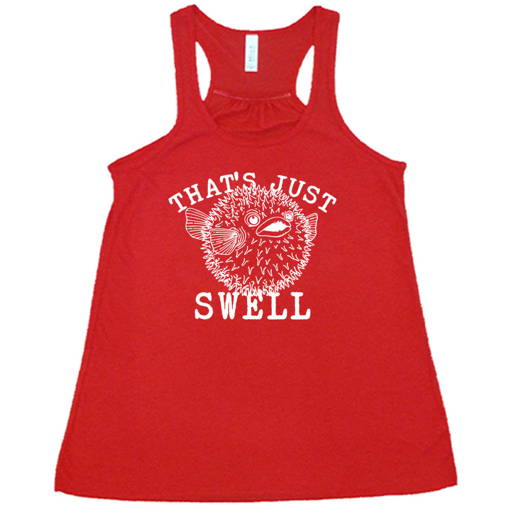 Red colored flowy tank with a pufferfish graphic on it that says "That's Just Swell" 