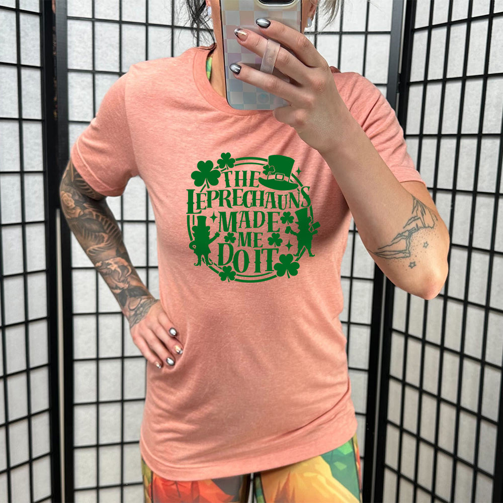 peach shirt with the quote "Leprechauns Made Me Do It" on it