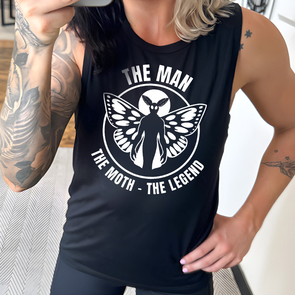 Model wearing black colored muscle tank with mothman graphic on it that says "The Man The Moth The Legend"