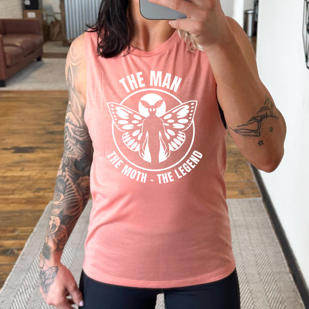 peach muscle tank with mothman graphic on it that says "The Man The Moth The Legend" 