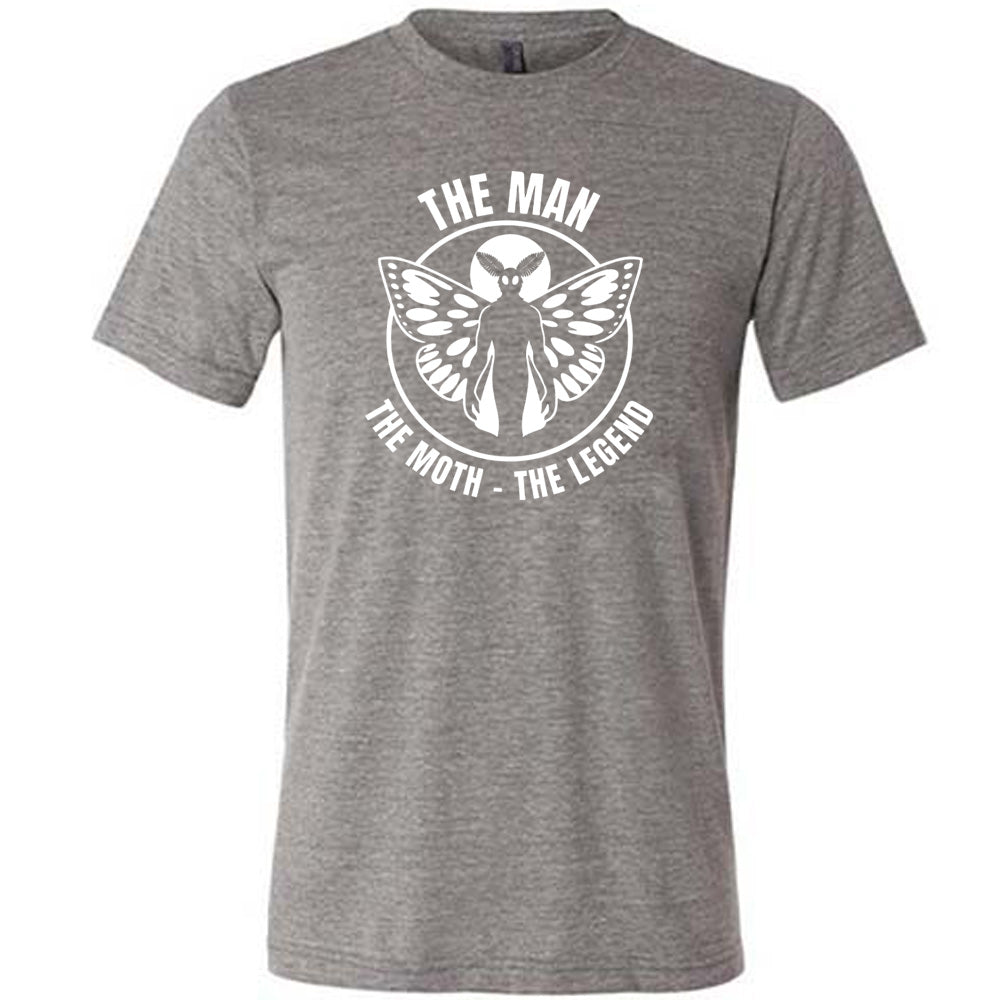 Grey colored shirt with mothman graphic on it that says "The Man The Moth The Legend"