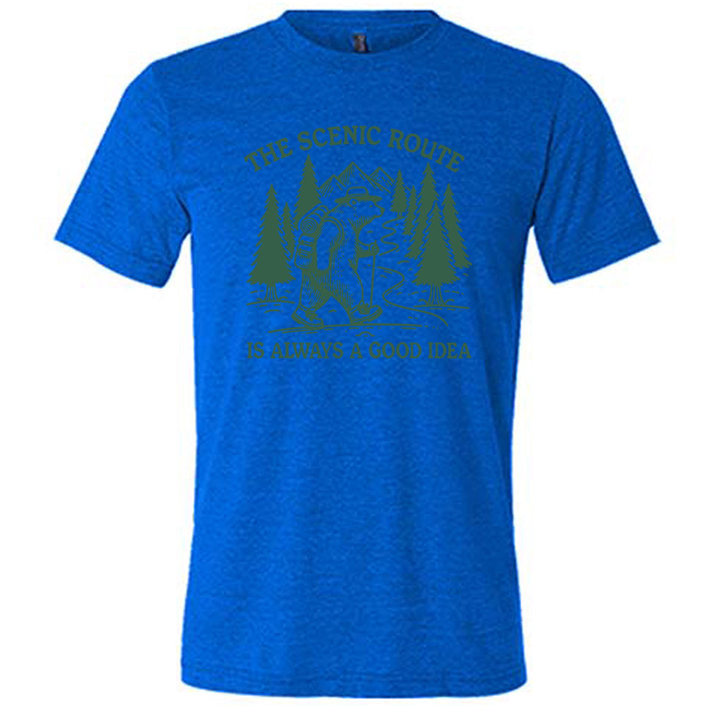 blue unisex tee with the words "the scenic route is always a good idea" with a bear hiking on a trail through the woods 
