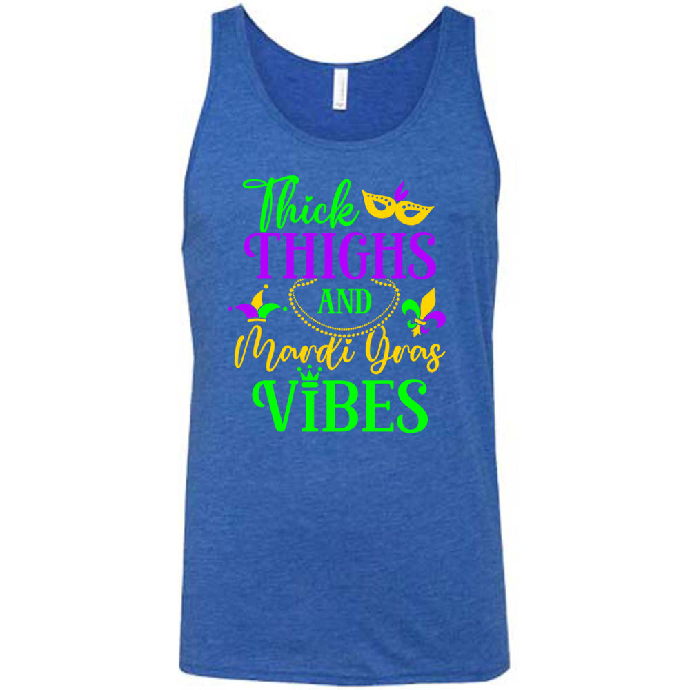 blue unisex tank with the words "thick thighs and mardi gras vibes" on it in varying font, with small graphics of mardi gras beads, fleur de lis, a joker hat and a mask