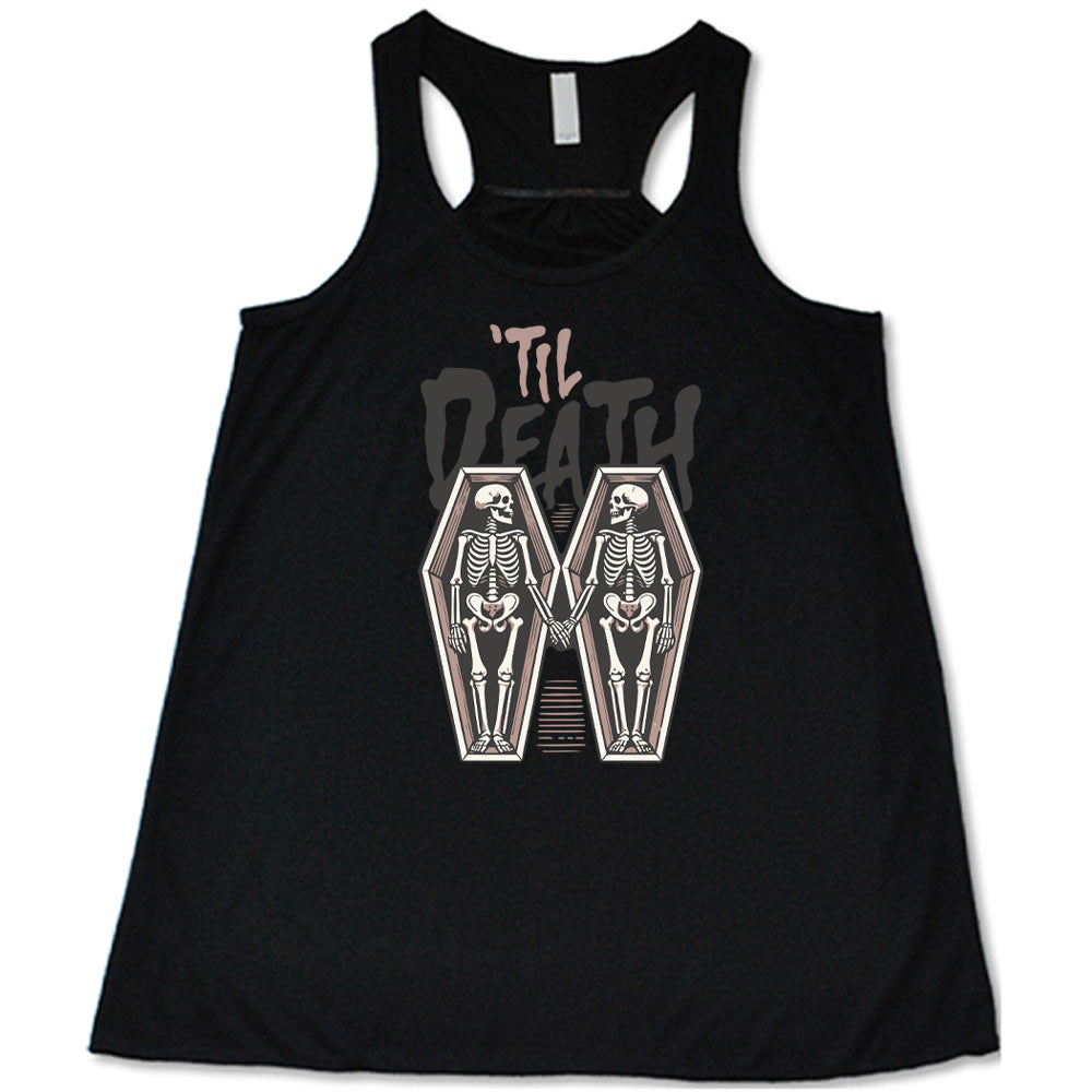 black flowy tank with the words "'til death" on it, with graphics of two skeletons, both in their own coffins, holding hands in the middle