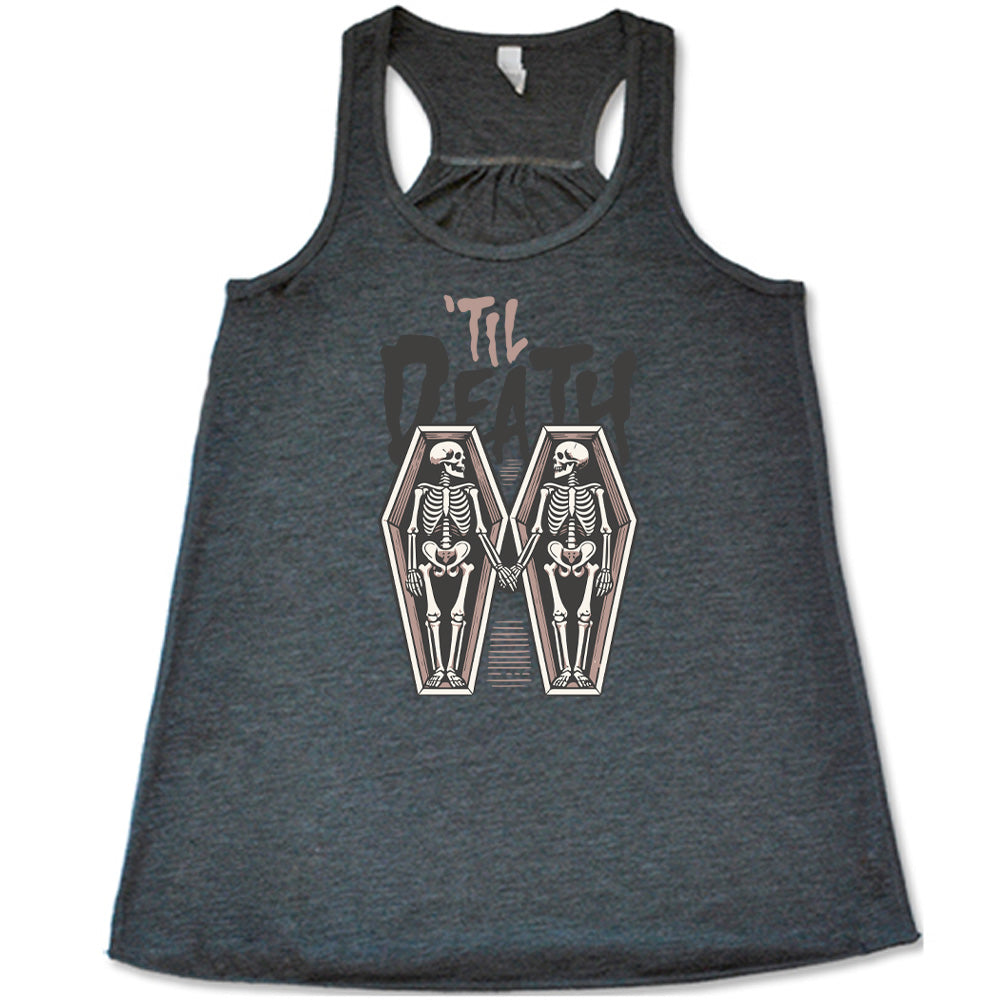 grey flowy tank with the words "'til death" on it, with graphics of two skeletons, both in their own coffins, holding hands in the middle