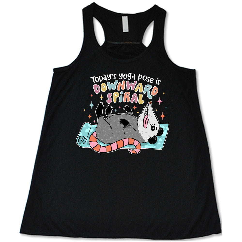 black flowy tank with the words "Today's yoga pose is a downward spiral" and the graphic of a possum playing dead on a yoga mat