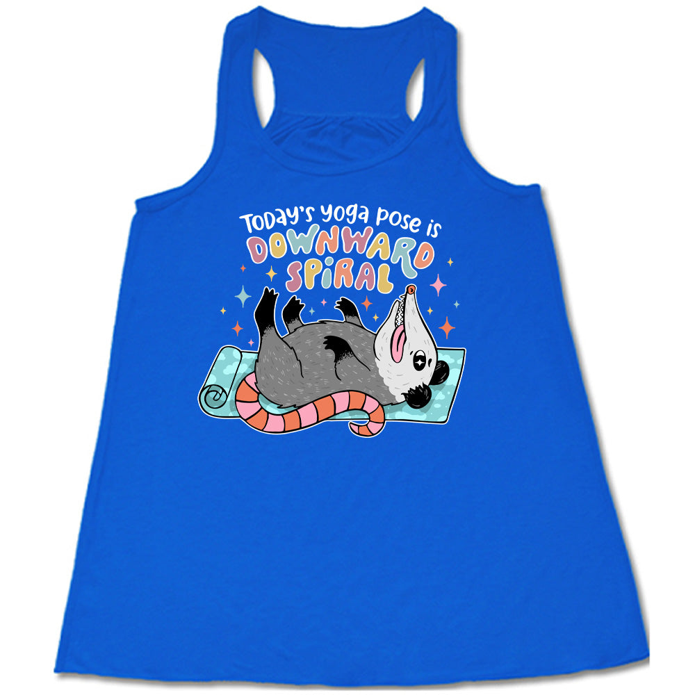 Blue flowy tank with the words "Today's yoga pose is a downward spiral" and the graphic of a possum playing dead on a yoga mat