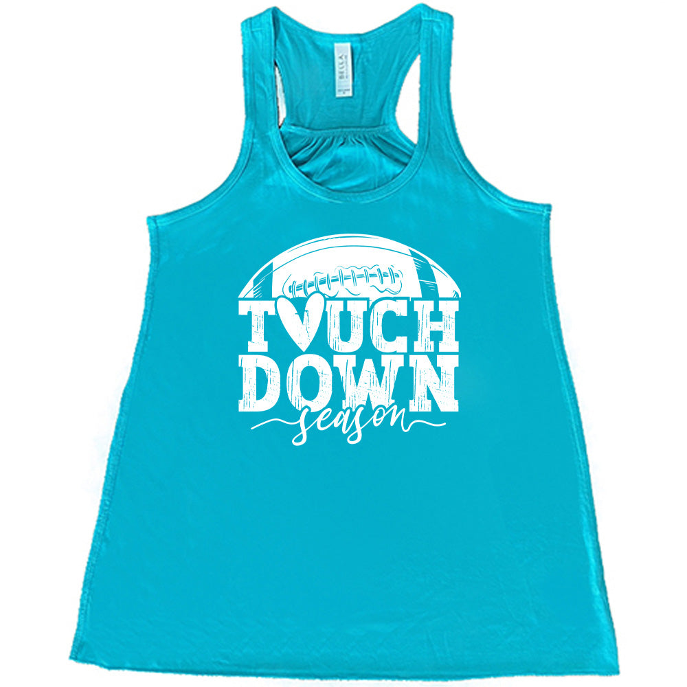 Teal colored flowy tank with football graphic on it that says "Touchdown Season"