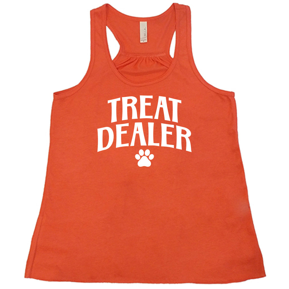 Coral colored flowy tank with paw print graphic on it that says "TREAT DEALER"