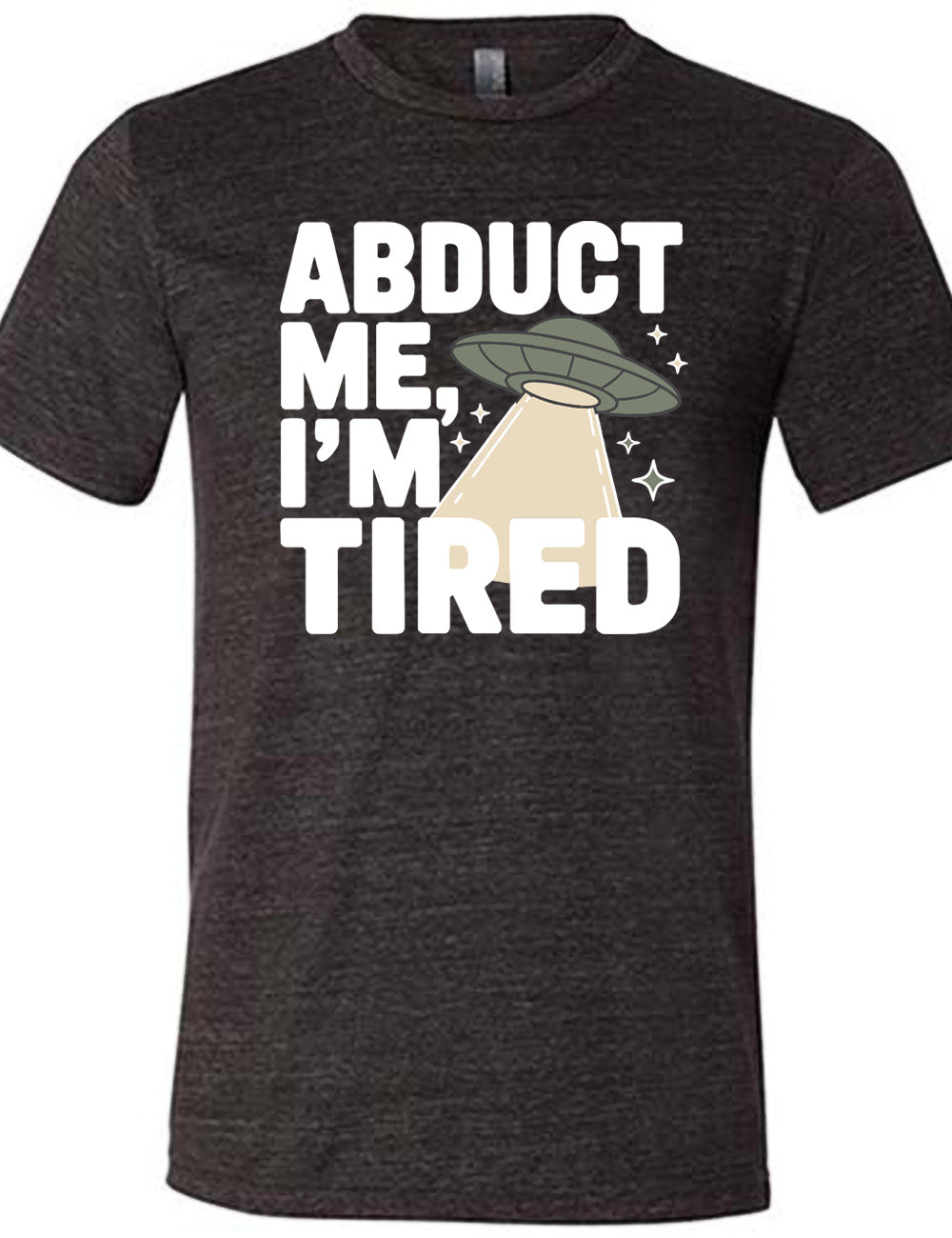 black unisex tee with the words "abduct me, I'm tired" on it, with a graphic of an alien spaceship, with a beam extended, and a few little stars