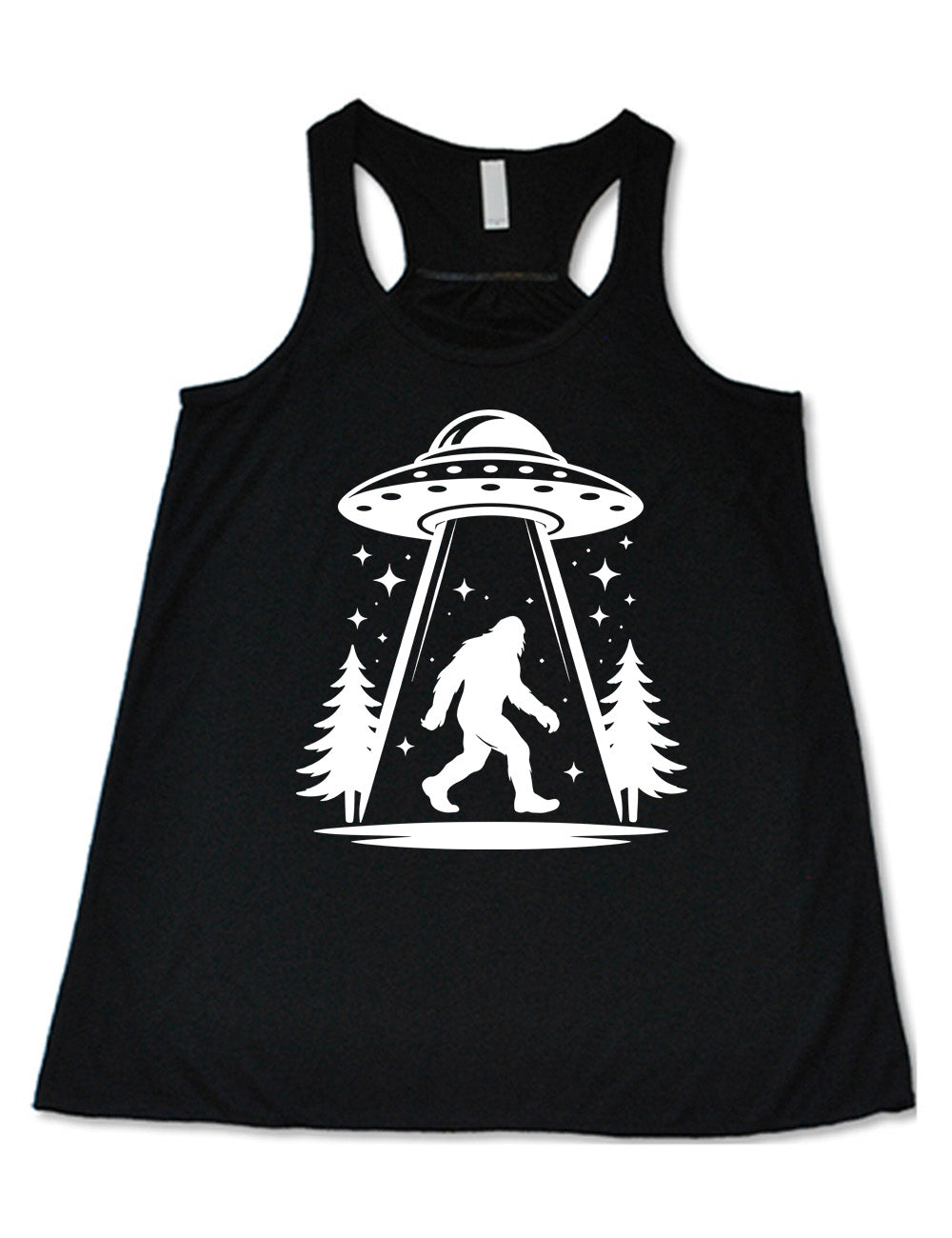 black flowy racerback tank with the graphic of an alien spaceship beaming bigfoot up, with stars surrounding, and couple pine trees