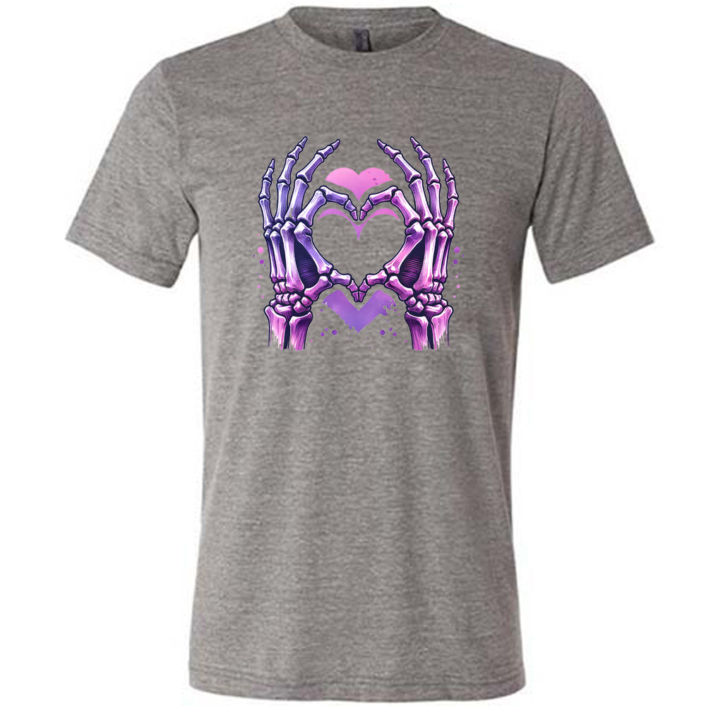 grey shirt with a skeleton heart hand graphic on it