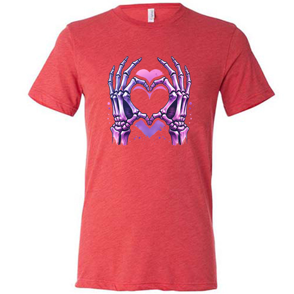 red shirt with a skeleton heart hand graphic on it