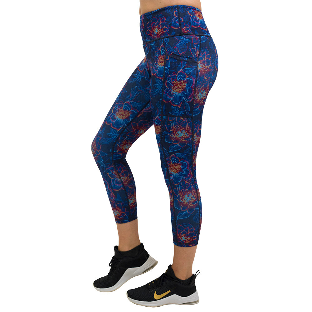 luminous lotus capri leggings facing the side