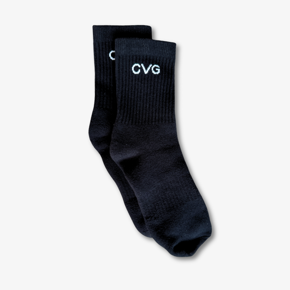 Black socks with 'CVG' logo on a light gray background
