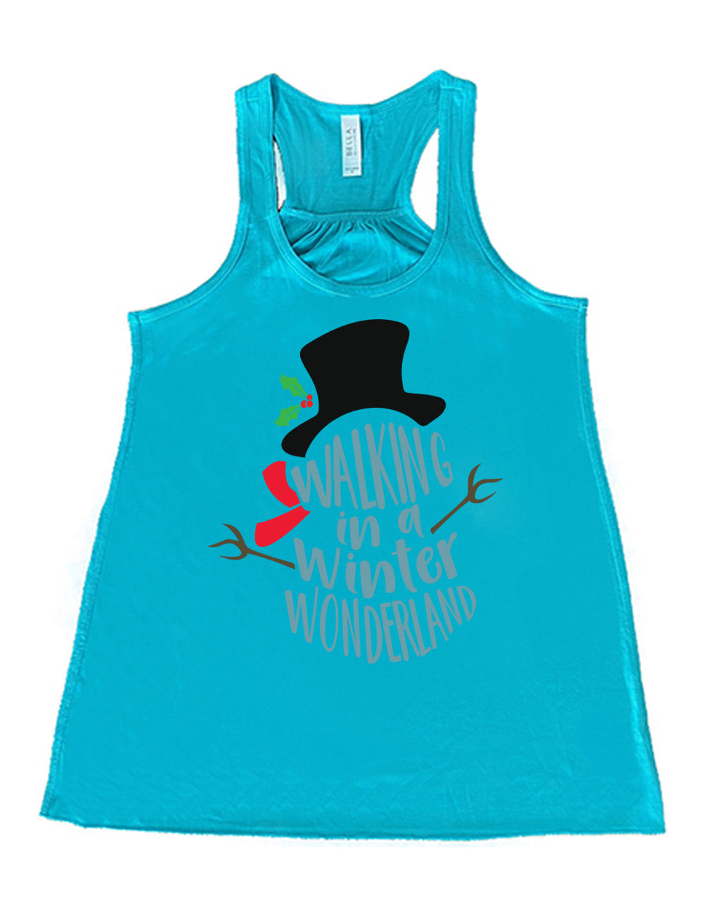 teal flowy racerback tank with the words in the stacked shape of a snowman saying "walking in a winter wonderland" with the graphic completion of the snowman with stick arms, a red scarf, and a top hat with a holly branch accessory on it
