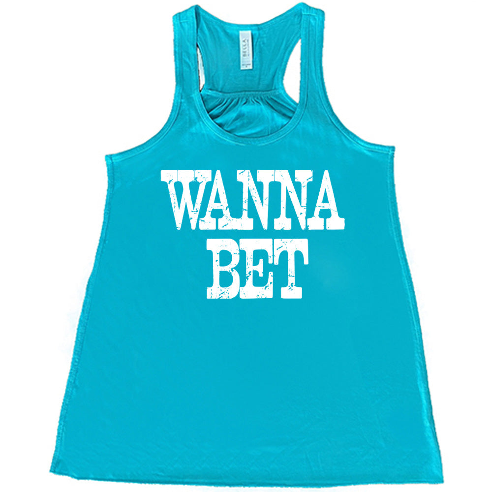 teal flowy tank with the words "wanna bet" in all capitals on it