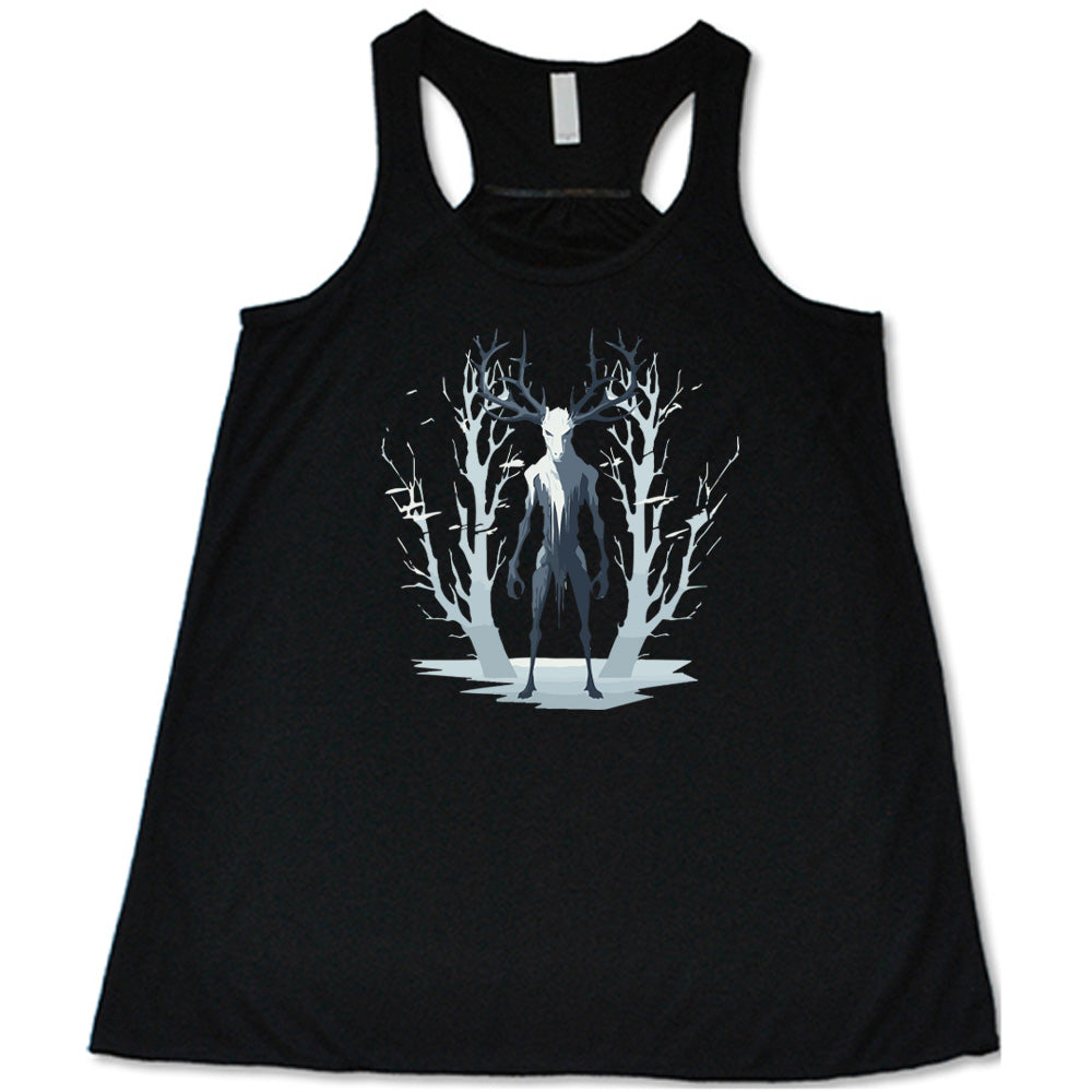 Black colored flowy tank with wendigo in the woods graphic on it