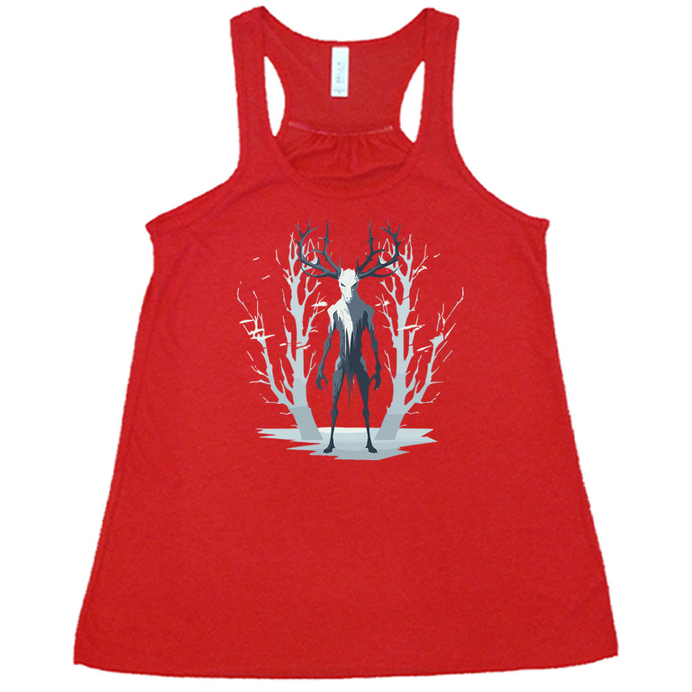 Red colored flowy tank with wendigo in the woods graphic on it