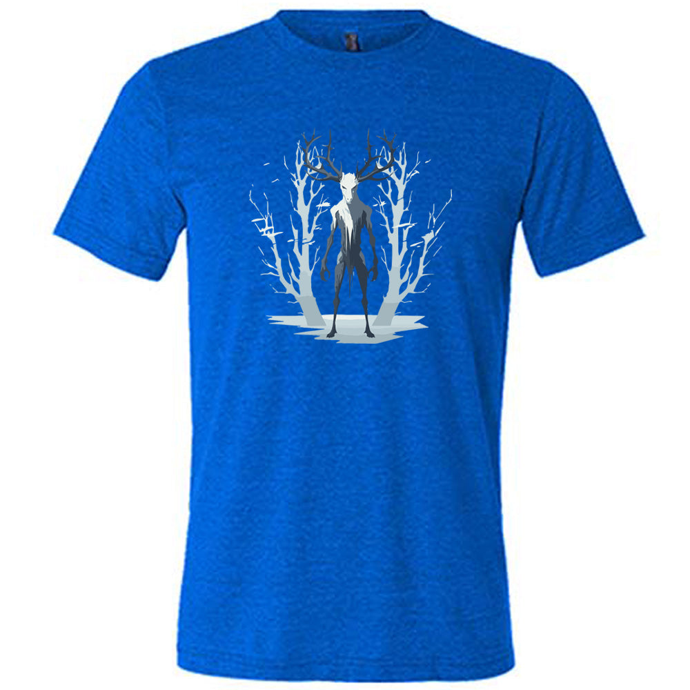 Blue colored shirt with wendigo in the woods graphic on it