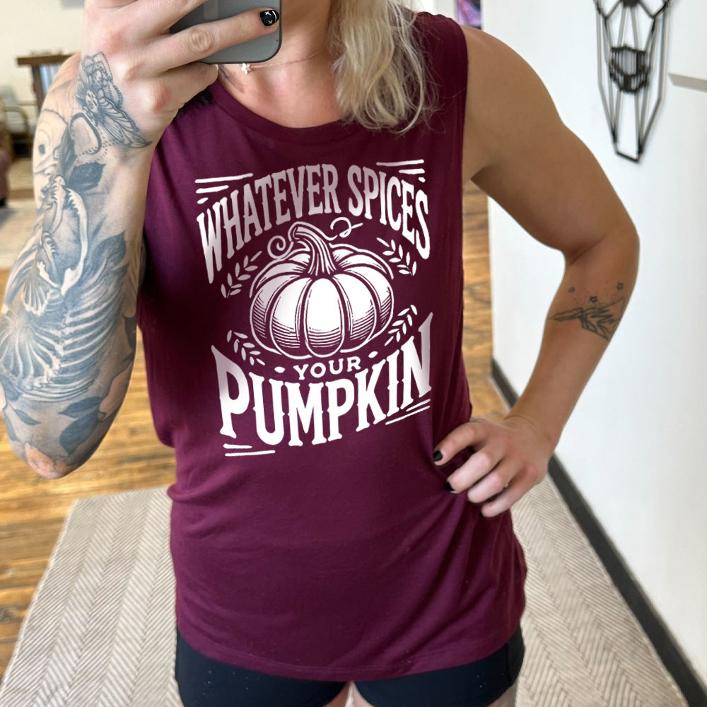 Model wearing maroon colored muscle tank with pumpkin graphic on it that says "Whatever Spices Your Pumpkin" 