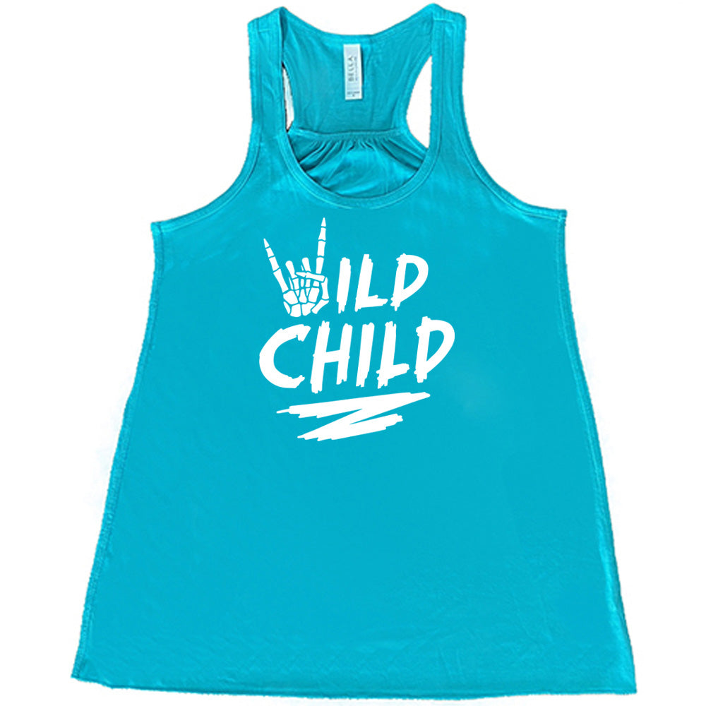 Teal colored flowy tank with a skeleton hand signing rock on graphic on it that says "Wild Child" 