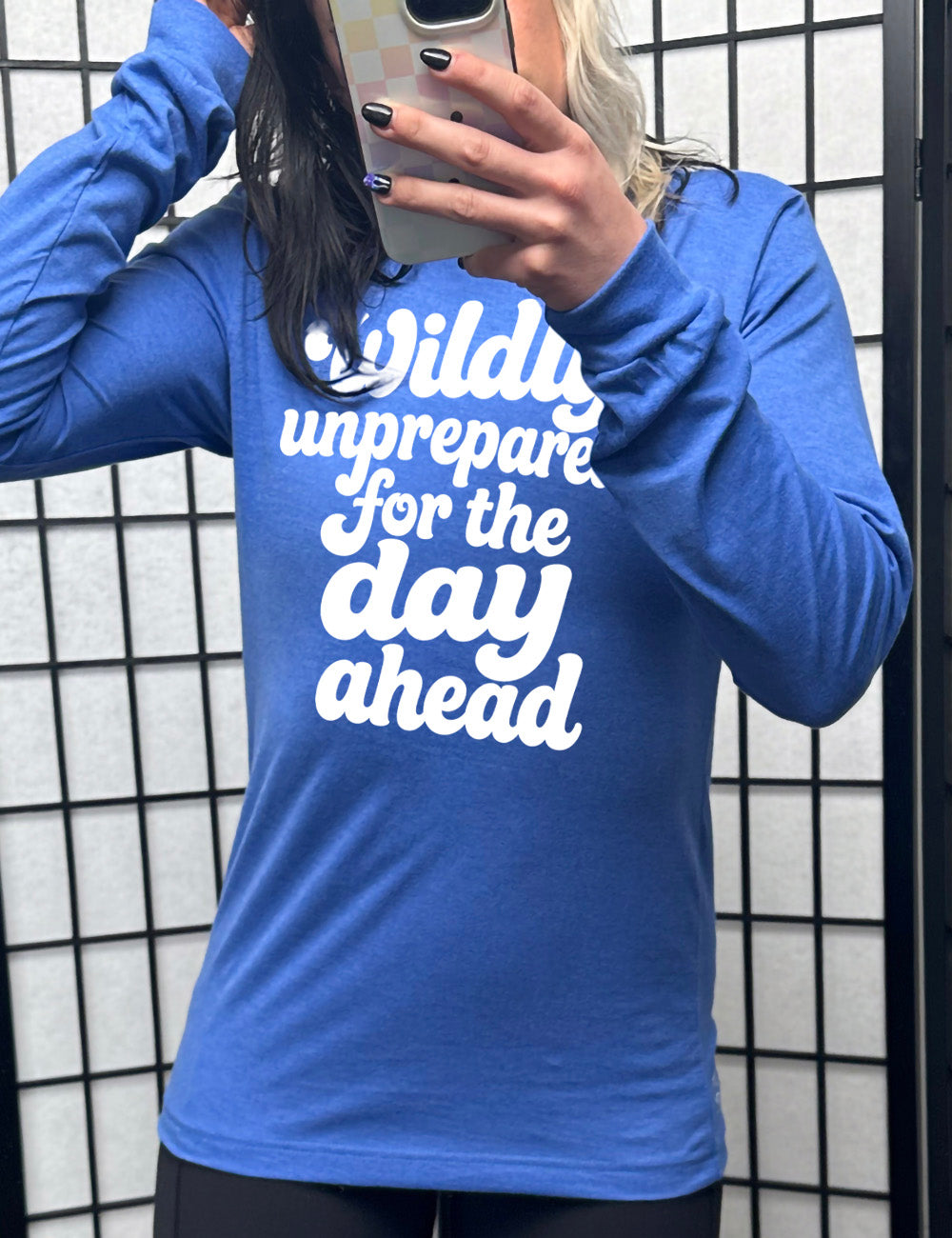 heather true royal long sleeve tee with words on it saying "Wildly unprepared for the day ahead"