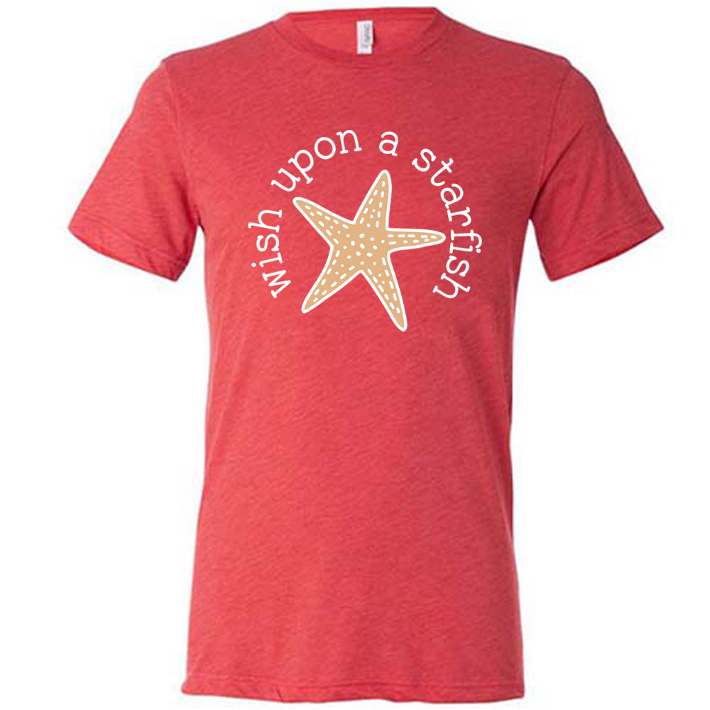 red unisex tee with the graphic of a starfish, and the words arched around it saying "wish upon a starfish"