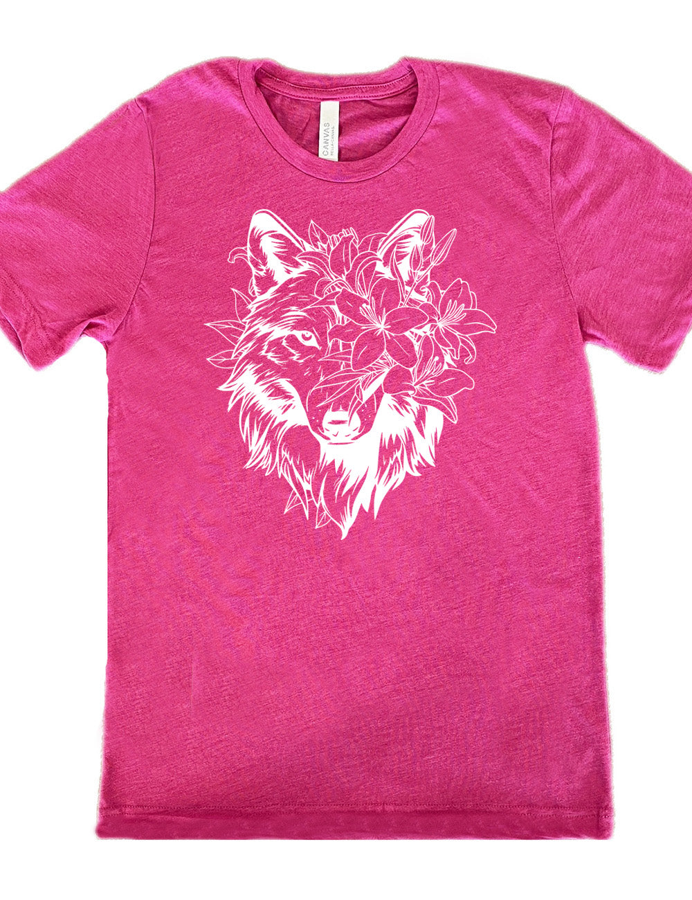 berry unisex tee with the large graphic of a wolf's head, with lilies covering half of the face, and growing behind its head too