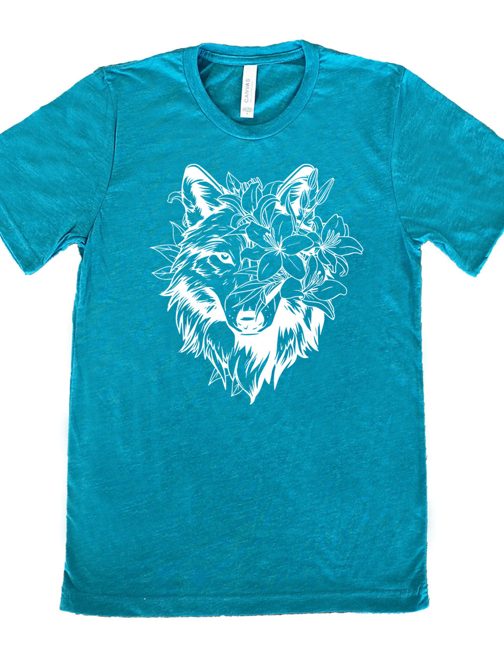 teal unisex tee with the large graphic of a wolf's head, with lilies covering half of the face, and growing behind its head too