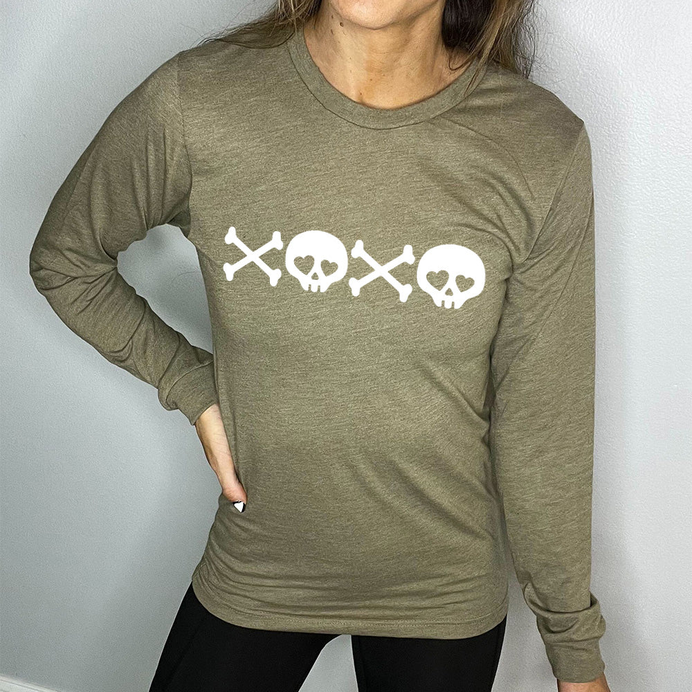 heather olive long sleeve shirt with graphics of crossed-bones and skulls (with hearts for eyes) forming the phrase "XOXO"