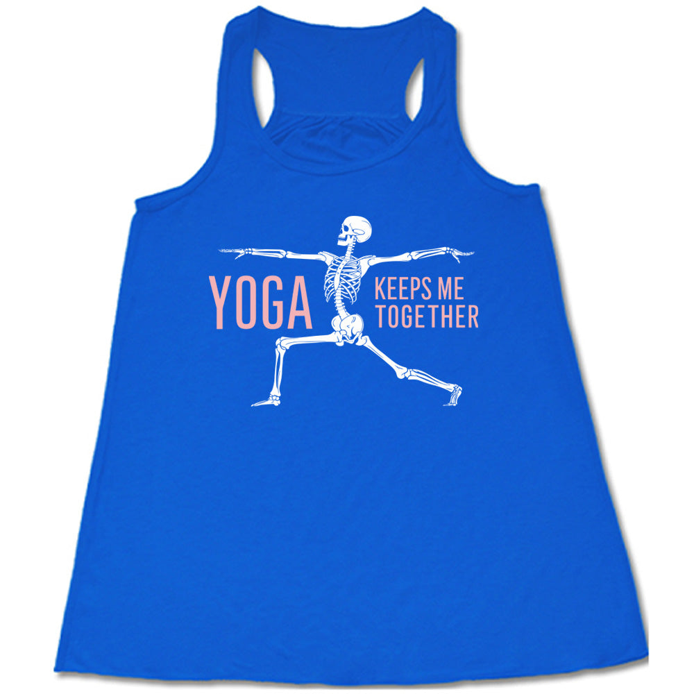 blue flowy tank with the words "yoga keeps me together" with graphic of a skeleton doing the warrior pose