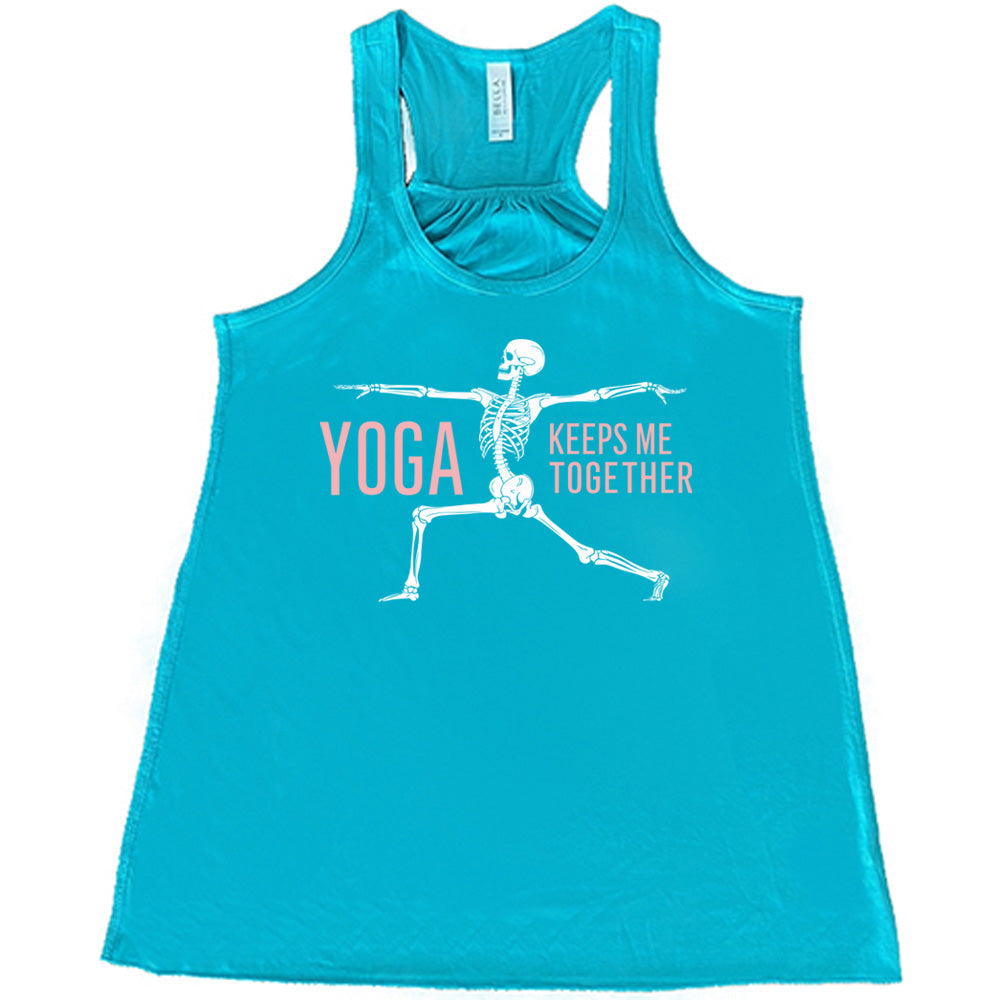 teal flowy tank with the words "yoga keeps me together" with graphic of a skeleton doing the warrior pose