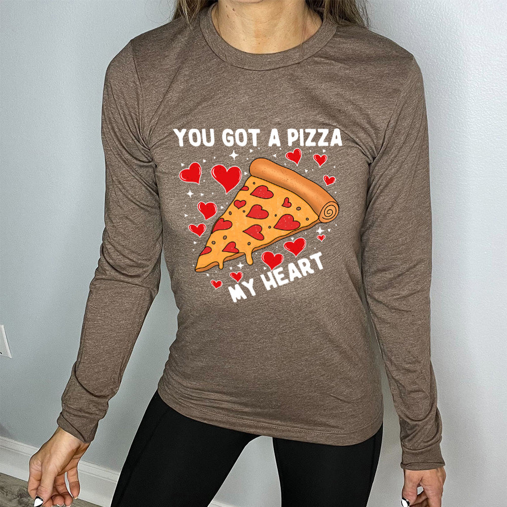 heather brown long sleeve shirt with the words "you got a pizza my heart" on it, with a big graphic of a pizza with pepperoni hearts, and hearts surrounding it as well with little stars