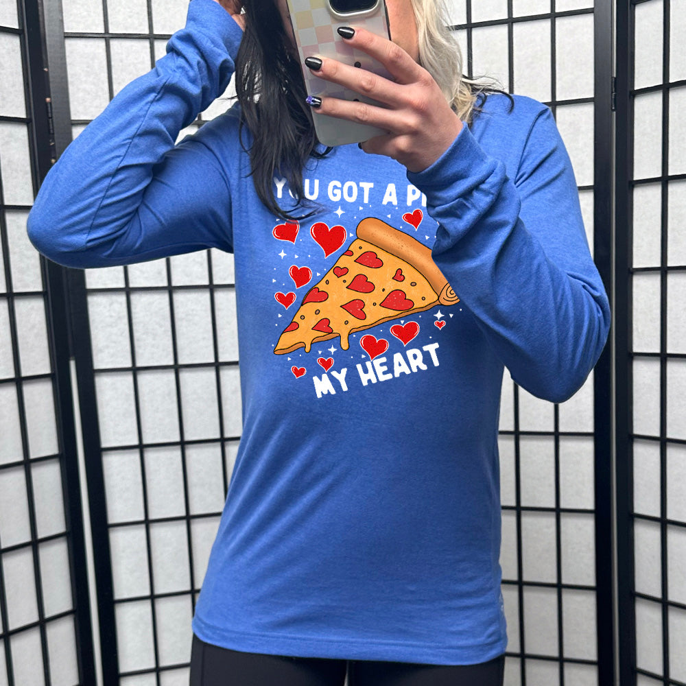 true royal long sleeve shirt with the words "you got a pizza my heart" on it, with a big graphic of a pizza with pepperoni hearts, and hearts surrounding it as well with little stars