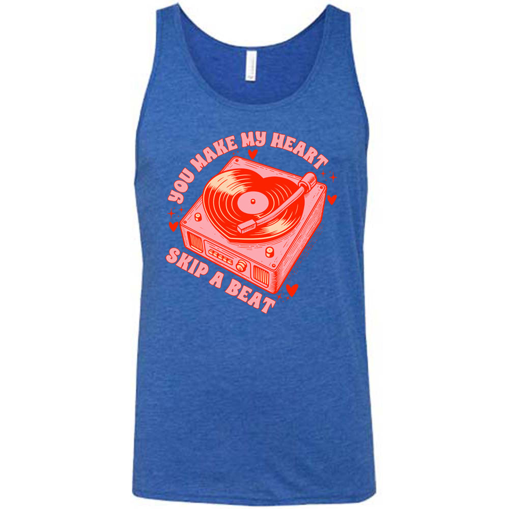blue unisex tank with the words "you make my heart skip a beat" on it, with the graphics of a record player, with a record shaped like a heart, with a little hearts and stars around each corner of the player