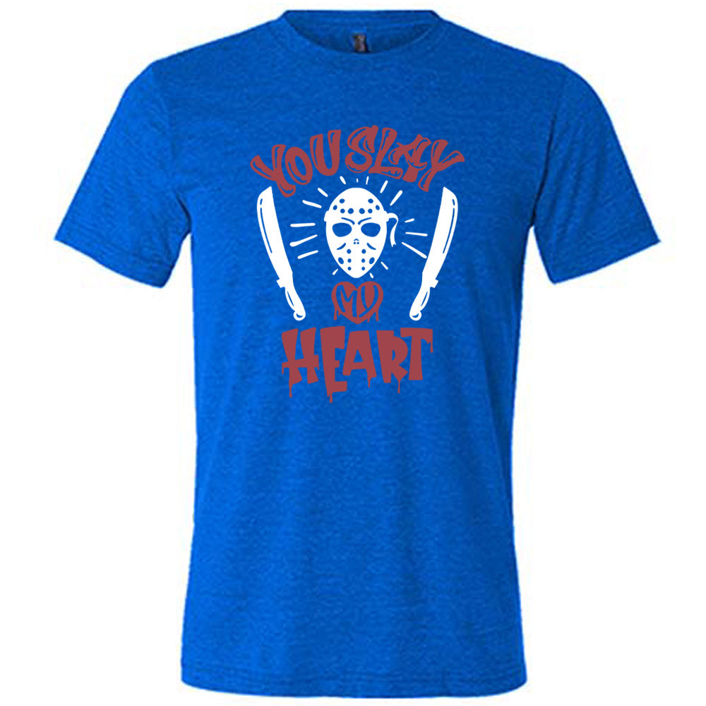 blue unisex tee with the words "you slay my heart" on it in horror movie style writing, with "my' being in a dripping heart, and graphics of the Jason mask from Friday the 13th and two machetes 