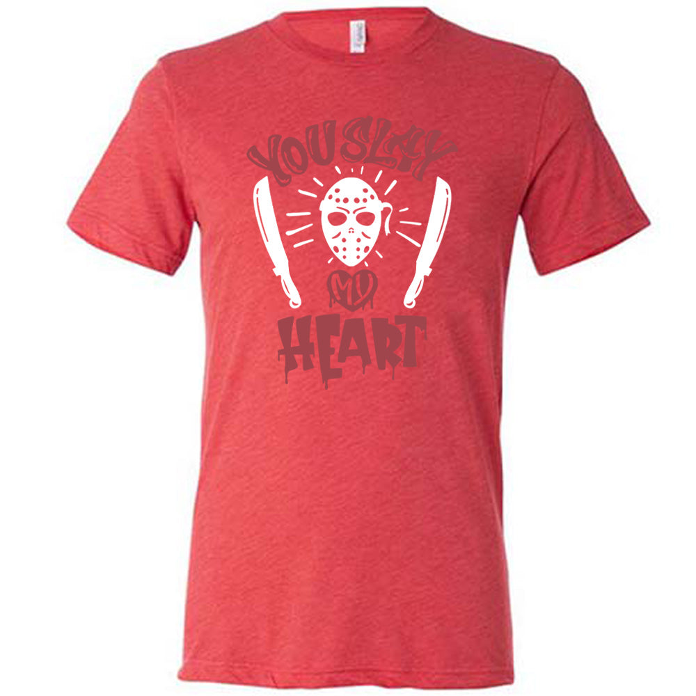 red unisex tee with the words "you slay my heart" on it in horror movie style writing, with "my' being in a dripping heart, and graphics of the Jason mask from Friday the 13th and two machetes 