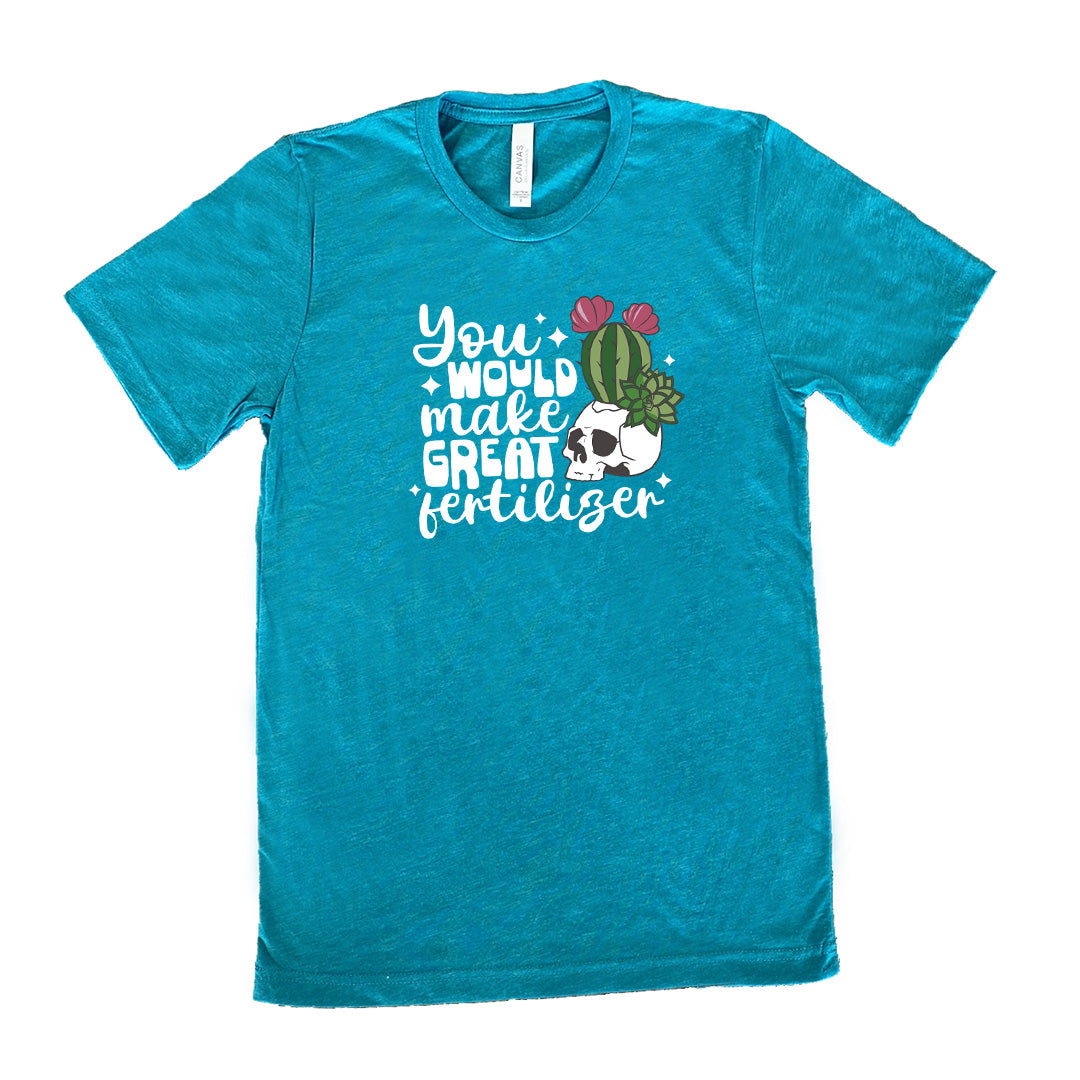 Teal colored shirt with a cactus growing from a skull graphic on it that says "You Would Make Great Fertilizer" 