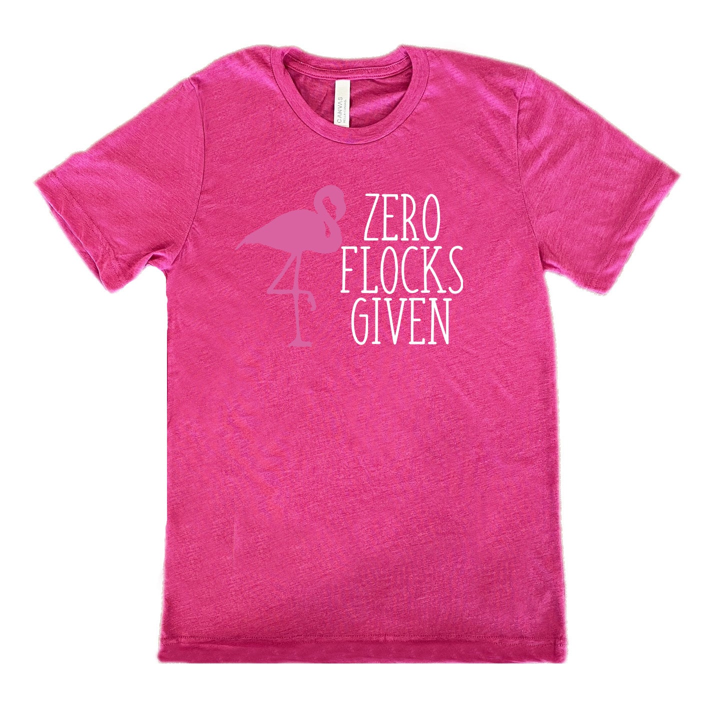 berry unisex tee with the words "zero flocks given" on it, with the pink silhouette of a flamingo, leg raised, next to the words