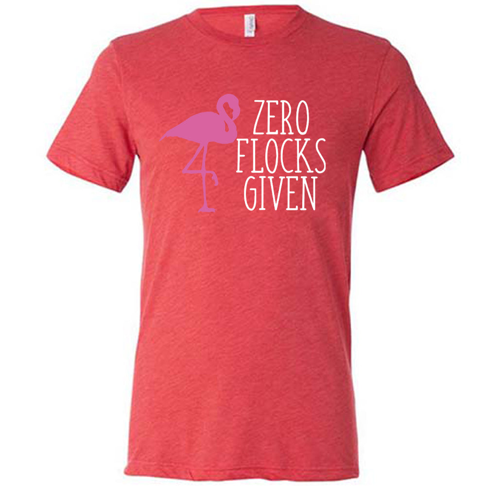 red unisex tee with the words "zero flocks given" on it, with the pink silhouette of a flamingo, leg raised, next to the words