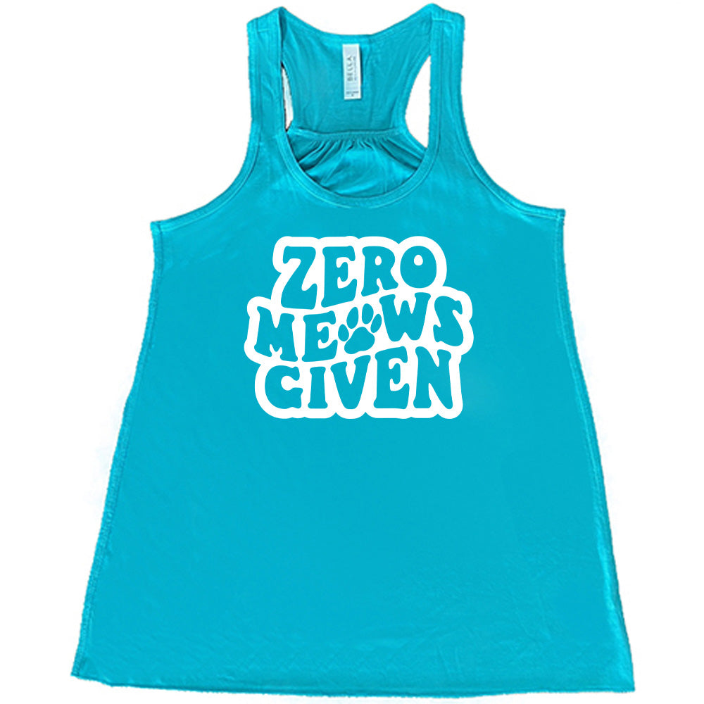 Teal colored flowy tank with paw print graphic on it that says "Zero Meows Given"