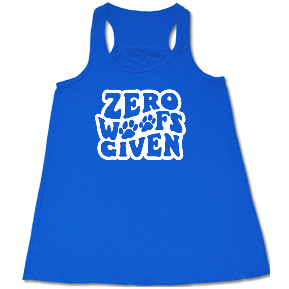 Blue colored flowy tank with paw print graphic on it that says "Zero Woofs Given"